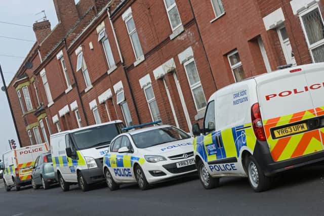A heavy Police presence on Cross Street, Balby, after the body of a 43-year-old man was discovered. Picture: Marie Caley NDFP Balby Murder MC 2
