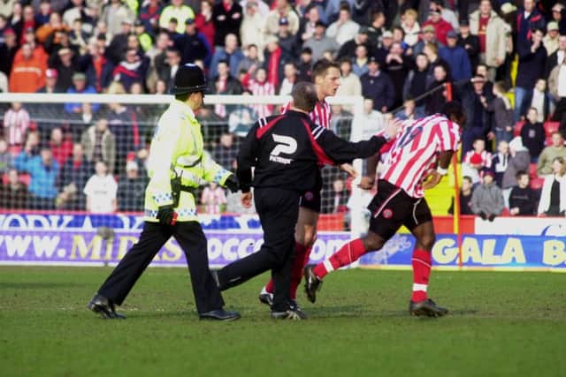 Sheffield United's Patrick Suffo is sent off under pressure.