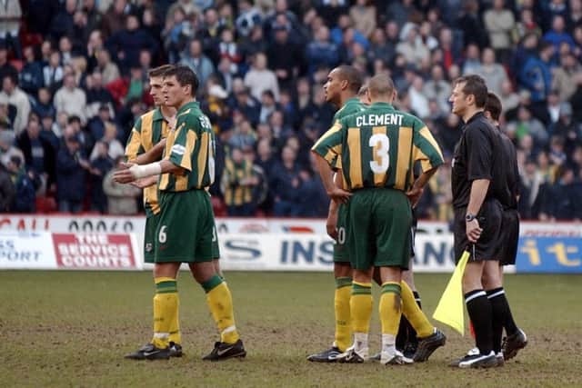 West Brom player stare in disbelief after their game against Sheffield United, in the Nationwide League Division One match at Sheffield United's Bramall Lane ground, is abandonned. Saturday March 16, 2002