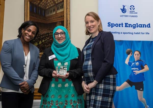 Fariyah Safah, from Nether Edge, Sheffield, receives the Sport England Sportivate Participant of the Year award from rugby world cup winner Maggie Alphonsi MBE and minister for sport and tourism Tracey Crouch.