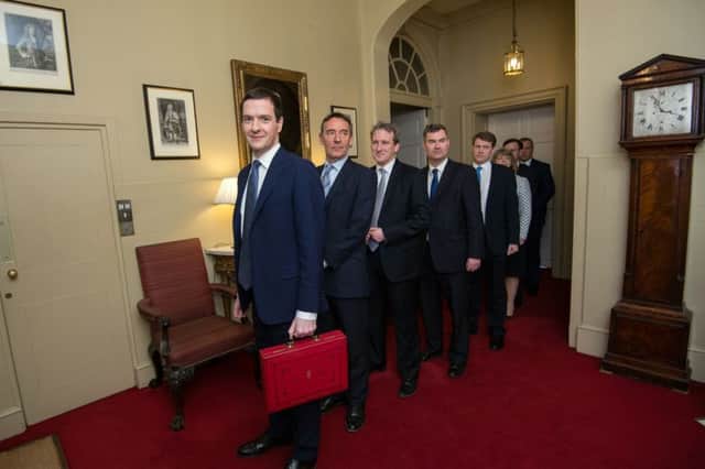 Chancellor of the Exchequer George Osborne leaves 11 Downing Street, London, with his Treasury team (from the left) Lord O'Neill, Damian Hinds, David Gauke, Chris Skidmore, Harriett Baldwin, Greg Hands and Conor Burns, before heading to the House of Commons to deliver his Budget. PRESS ASSOCIATION Photo. Picture date: Wednesday March 16, 2016. See PA story BUDGET Main. Photo credit should read: Stefan Rousseau/PA Wire