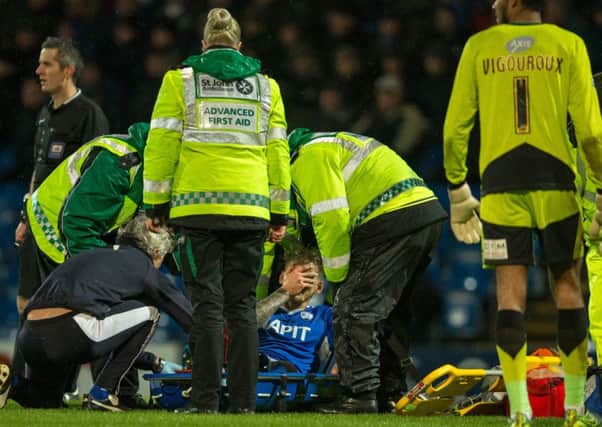 Chesterfield vs Swindon Town - Daniel Jones is stretchered off through Injury - Pic By James Williamson