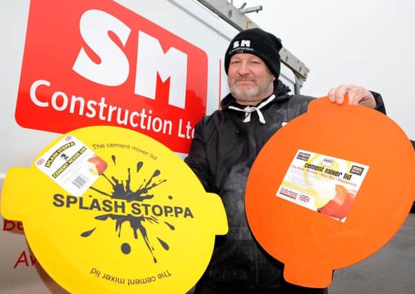 Simon Meadows has invented the Splash Stoppa, a new lid for cement mixers which prevents workers from suffering cement burns. Picture: Andrew Roe
