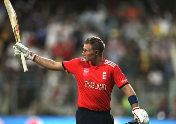 England's Joe Root  raises his bat after his century (AP Photo/Rafiq Maqbool)