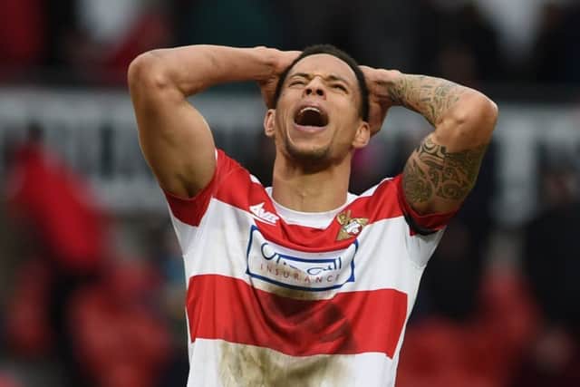 Nathan Tyson shows his disappointment at the final whistle.