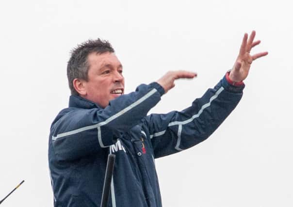 Mark Aston shouts instructions to his players as he takes charge of his  500th Eagles  game. 
Picture Dean Atkins