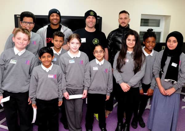 World champion boxer Kell Brook, Ryan Rhodes and Sam O'Maison at the Hatfield Academy. Picture: Andrew Roe