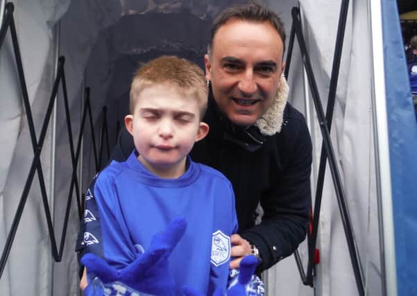Day of his life: Joe Danforth with Owls boss Carlos Carvalhal