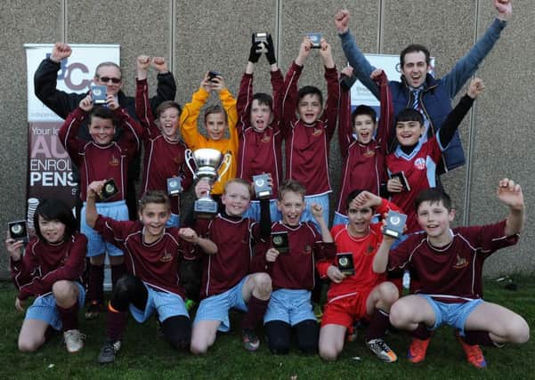 Wath C of E School celebrate winning the Totty Cup Final. Picture: Andrew Roe