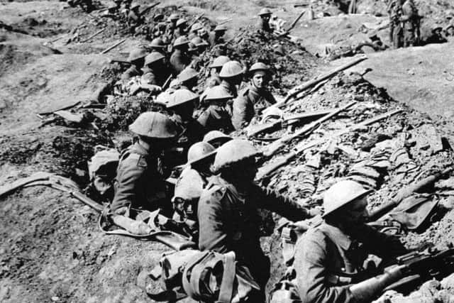British infantrymen in a shallow trench during the Battle of the Somme