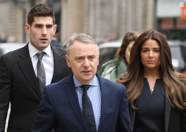 Ched Evans  arrives at the Court of Appeal in London with his partner Natasha Massey as a review into his conviction for rape continues. Picture: PA