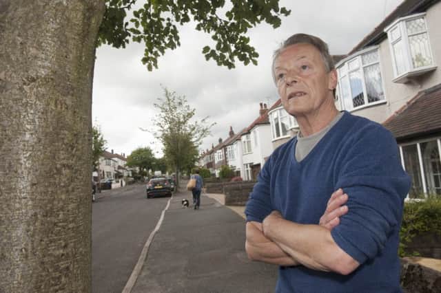 Trees under threat of destruction by Sheffield City Council in the streets of Greenhill which local residents are protesting against
Dave Dillner stands with some of the trees they feel should be saved