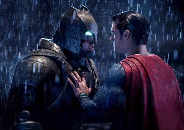 Ben Affleck as Batman and Henry Cavill as Clark Kent/Superman. Picture: PA Photo/Warner Bros.