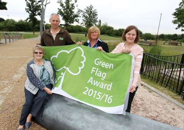 Manor Fields Park in which previously won its first Green Flag award recognising excellence in parks. Pictured are Coun Pat Midgley, Brett Nuttall from Green Estate, Diane Cairns, Friends of Manor Fields Park, and council leader Julie Dore.