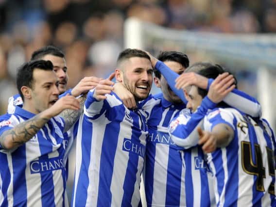 Sheffield Wednesday players celebrate another Gary Hooper goal