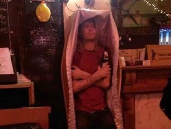 Puddle Of Mudd singer Wes Scantlin poses in a coffin at Cask Corner ahead of last night's chaotic gig in Doncaster. (Photo: Lucille Wardley).