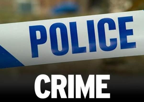 A police hunt has been launched for a man who allegedly carried out an armed robbery at a Doncaster petrol station.