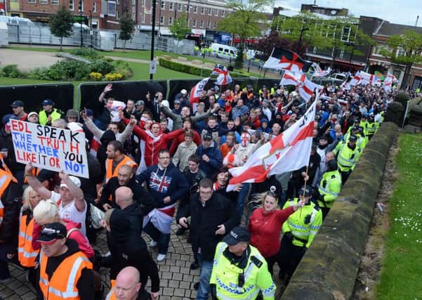 The EDL march makes its way round Rotherham town centre.