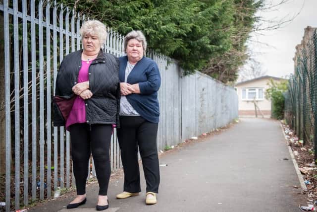 Residents Elaine Jarvill and Diana Hastead who want Doncaster Council to put street lighting around the alleyways that surround their homes at Balby
Picture Dean Atkins