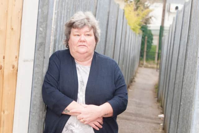 Resident Elaine Jarvill who wantsDoncaster Council to put street lighting around the alleyways that surround their homes at Balby
Picture Dean Atkins