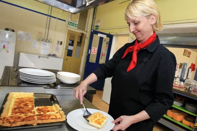 Liz O'neill and Kate Stevenson have run the Old School Community Cafe at the old Sharrow Vale Junior School. Kate is pictured in the kitchen.