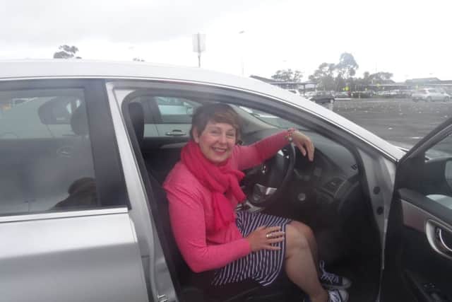 Faye Smith, founder of Keep Your Fork, learning to drive the automatic Toyota rental