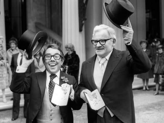 Ronnie Corbett and Ronnie Barker at Buckingham Palace after receiving the OBE from Queen Elizabeth II at an investiture (PA Archive)