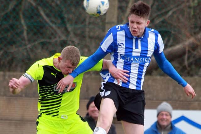 George Hirst in action for Wednesday's development side against Huddersfield earlier this week