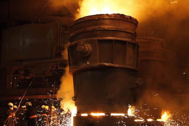 Steelworker at Sheffield Forgemasters. Picture by Simon Hulme