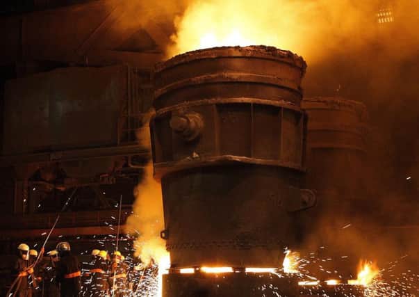 Steelworker at Sheffield Forgemasters. Picture by Simon Hulme