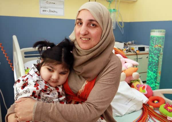 Treetop House's 15th anniversary at Sheffield Children's Hospital. Pictured are Shameem Aktar and her daughter Hajrah, four.