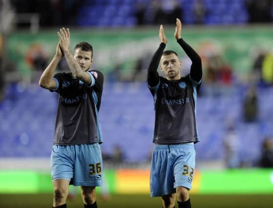 Jack Hunt (right) salutes Sheffield Wednesday's traveling support