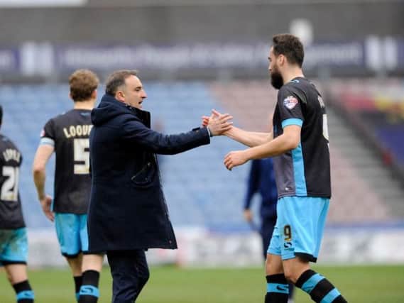 Owls boss Carlos Carvalhal and Atdhe Nuhiu after the 1-0 win over Huddersfield