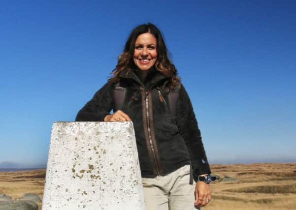 Julia Bradbury reaches the spiritual birthplace of walkers... the high point at Kinder Scout.