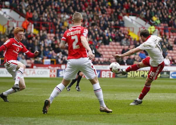 Billy Sharp of Sheffield Utd scores the second goal against Walsall