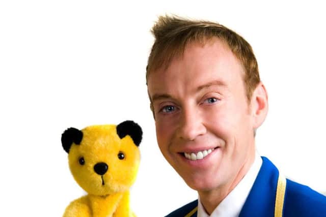 Sooty with presenter Richard Cadell.