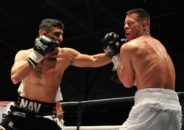 Nav Mansouri in action against Matthew Mallin  in Sheffield