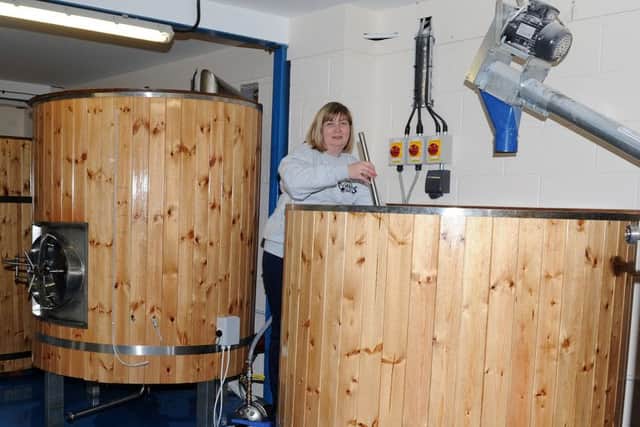 Andrea Steer, of Little Critters Brewing Company works on the masher. Picture: Andrew Roe