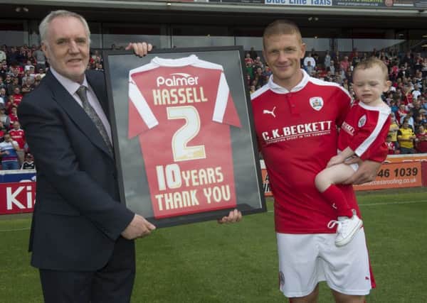 Patrick Cryne presents a shirt to Bobby Hassell for his service to the club. 
Picture Dean Atkins