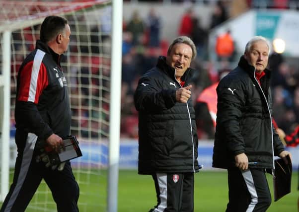 Neil Warnock celebrates a hard-won point at Bristol City