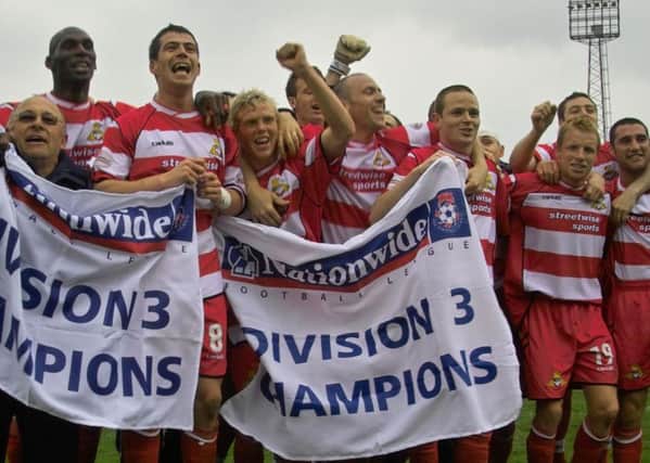 Rovers celebrate winning the old Division Three in 2004