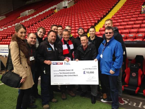 Football League sponsor Sky Bet hands over a cheque for Â£10,000 to Jeff Stelling in support of his Men United March for Prostate Cancer UK at Sheffield United's Bramall Lane.