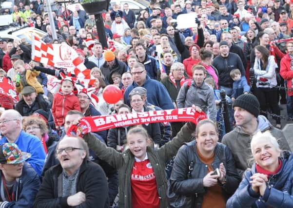 Fans crowd around the Town Hall to celebrate with Barnsley FC at the Town Hall. Picture: Marie Caley NSST Barnsley MC 5