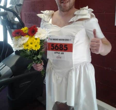 Gym instructor Lee Robertson, 41, is wearing a wedding dress for the 2016 Plusnet Yorkshire Half Marathon-Sheffield.