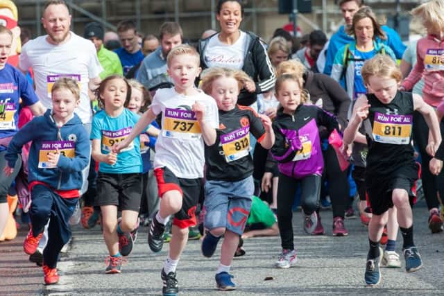 The Yorkshire Half Marathon held in Sheffield
Junior runners leave their startline on Pinstone Street