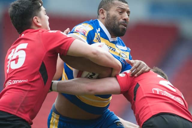 Two-try Jason Tali is halted by Jack Hansen and Andy Oakden of North Wales Crusaders. Picture Dean Atkins
