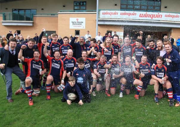 Doncaster Phoenix celebrate winning North One East after their victory over Guisborough.