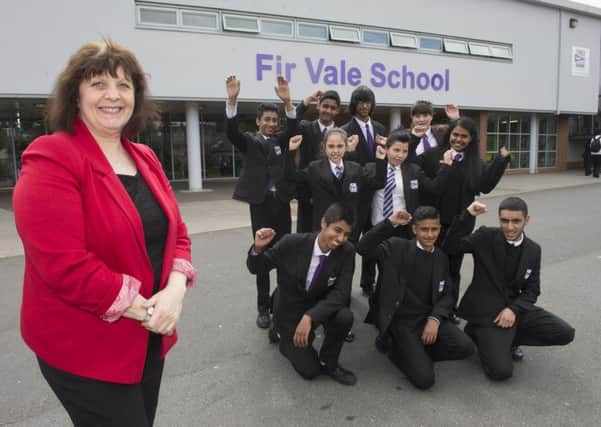 Pupils at Fir Vale School celebrate their good Ofsted report with Head Breffni Martin