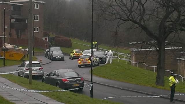 Police and forensics team on Spotswood Close, Gleadless Valley, Sheffield, where a womanÂ’s body was found early this morning