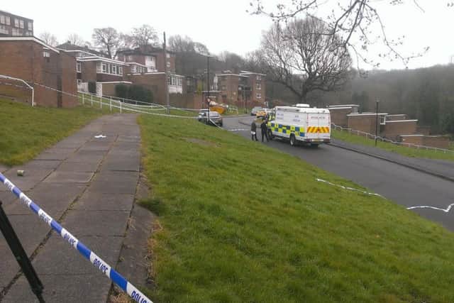 Police and forensics team on Spotswood Close, Gleadless Valley, Sheffield, where a womans body was found early this morning